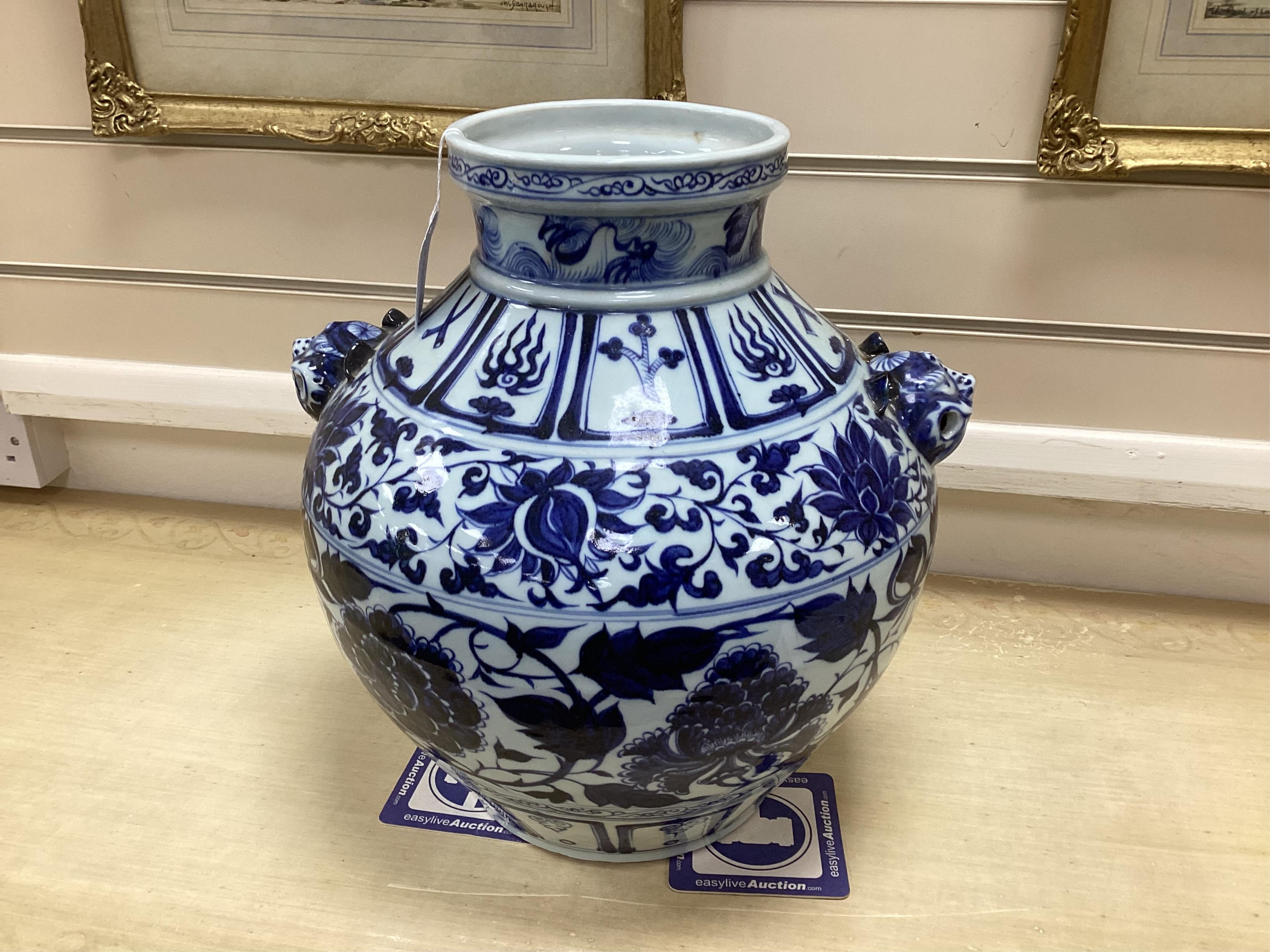 A Chinese blue and white pot vase with zoological handles, 38cm high